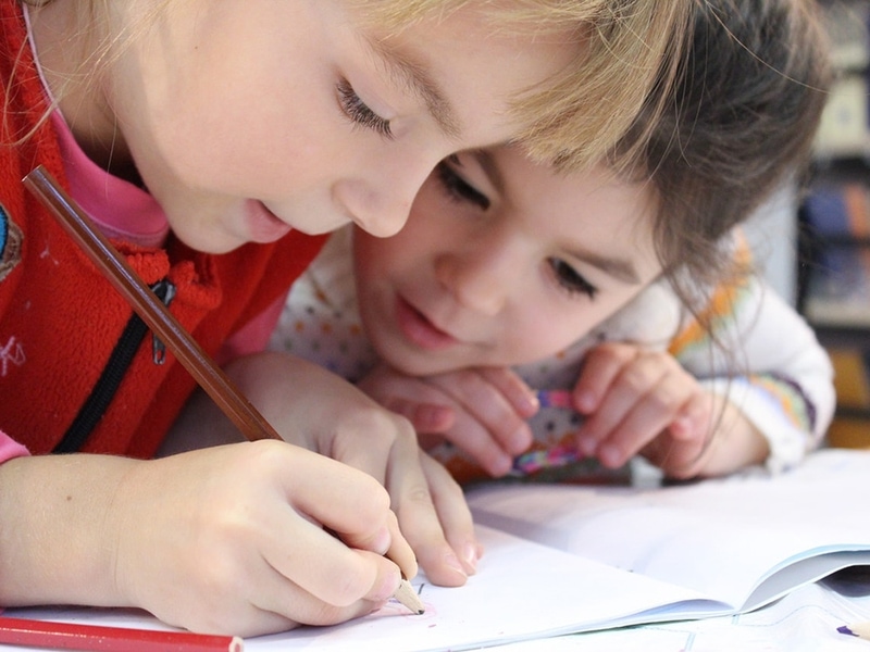 Two girls doing their homework